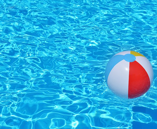 Colorful-inflatable-ball-floating-in-swimming-pool-